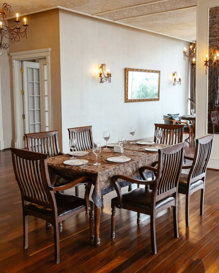 restaurant table with wooden chairs placed hall decorated classical style (1)